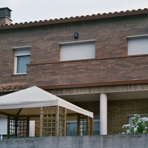 Unifamiliar con fachada de ladrillo